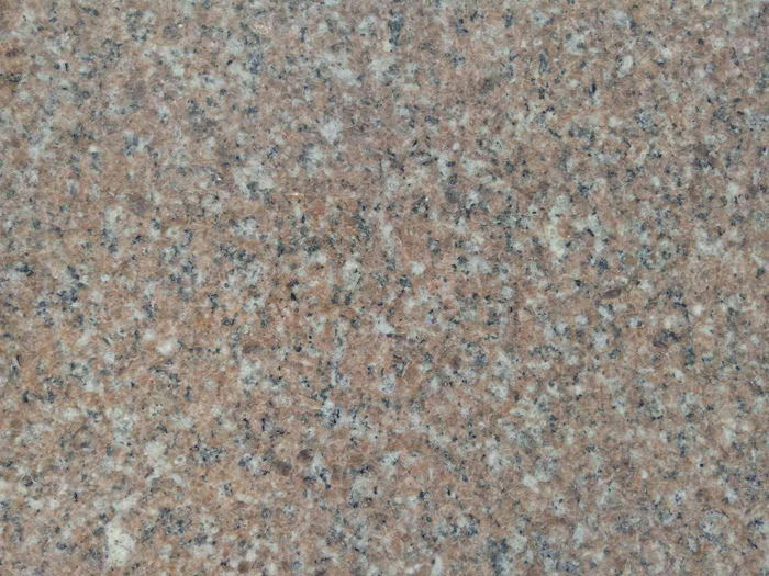 粉红麻石材的颜色花纹较稳定均匀